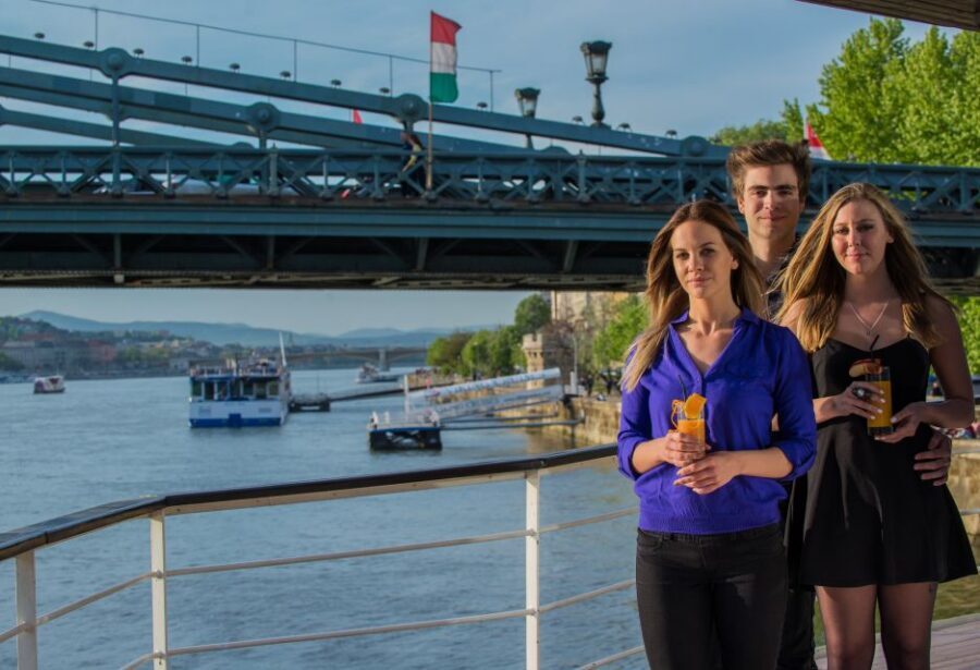 Budapest: 1 hr Sunshine Booze Cruise with Prosecco - The monument lineup: Parliament, bridges, and the Buda hill sights