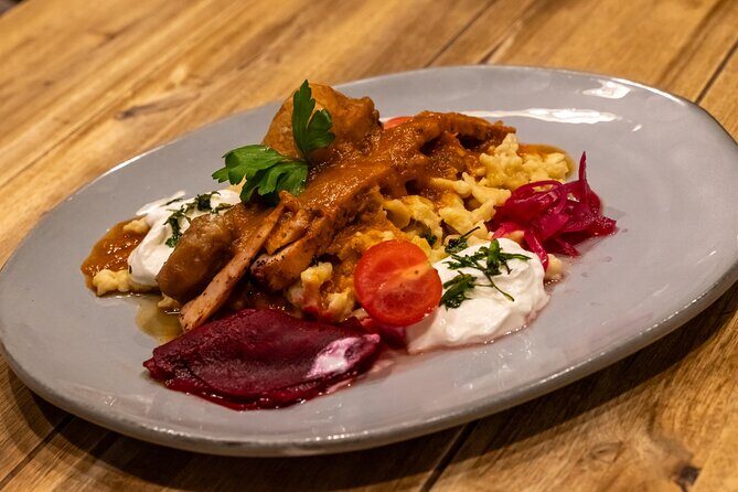 Budapest Dinner with a Local: 4-Course Meal with Wine & Palinka - Chicken paprikash and seasonal dessert: comfort without heavy fuss