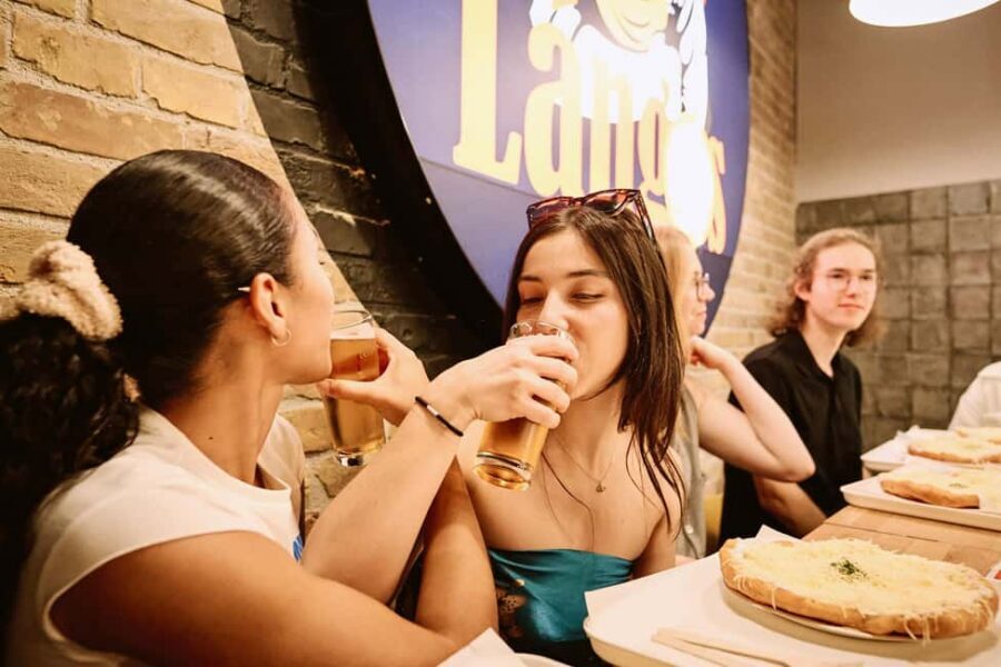 Budapest: Guided Street Food Tour with Sweet Wine - Four eateries in 150 minutes: soups, lángos, nokedli, and Flódni