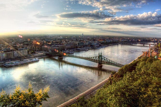 Budapest Private Full Day City Tour with a comfortable air -conditioned car - Heroes’ Square and Andrassy Avenue: power, monarchy, and the elegant walk