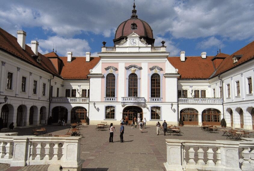 From Budapest: Gödöllő Palace of Queen Elizabeth Tour - The guided interior: stairs, halls, and era-specific rooms