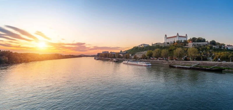 From Vienna: Bratislava & Budapest Guide One Day Tour - Pickup, Van Rides, and the Included Traunsee Lake Boat Trip
