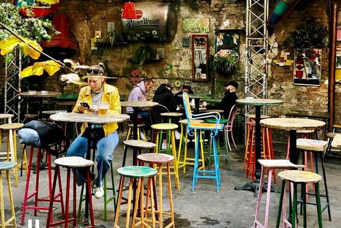 Ruin Pub Walking Tour with a Local Hostess in Budapest - Szimpla Kert finale: themed rooms, a guided walkthrough, and a surprise activity